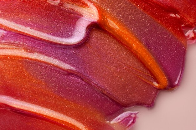 Vista superior brilho labial texturizado brilhante