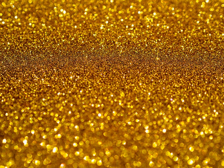 Foto grátis vista superior com fundo dourado brilhante