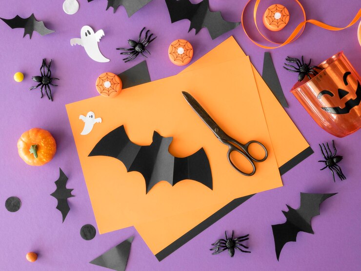 Foto grátis vista superior de arranjos de halloween feitos à mão