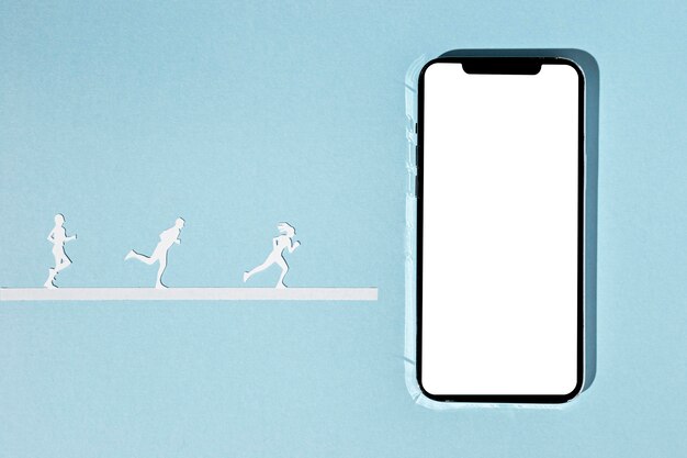 Vista superior de atletas de papel com smartphone