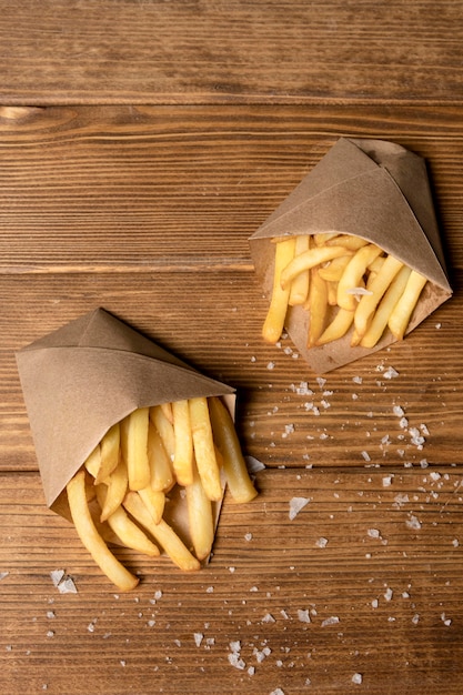 Foto grátis vista superior de batatas fritas com sal