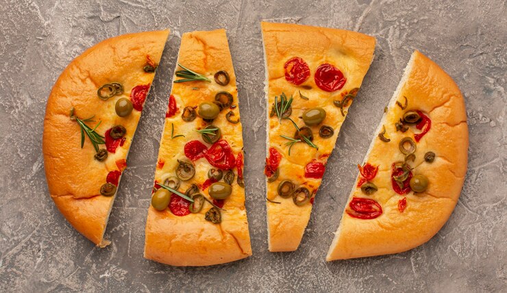 Foto grátis vista superior do delicioso arranjo de focaccia