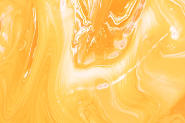 Vista superior mistura de tinta amarela