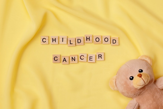 Foto grátis vista superior sobre os conceitos de fundo do mês de conscientização do câncer infantil,