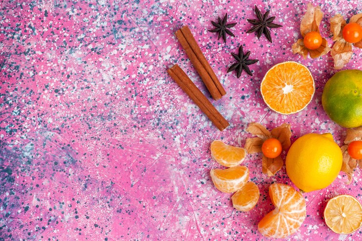 Foto grátis vista superior tangerinas azedas frescas com limões e canela no fundo rosa claro.