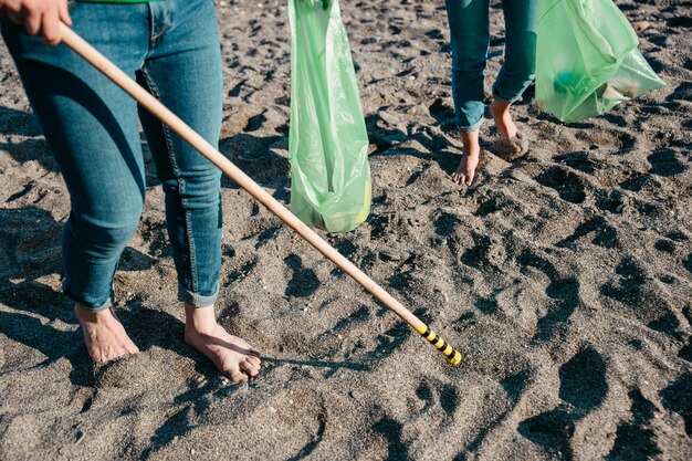 Voluntários, colecionar, desperdício, areia