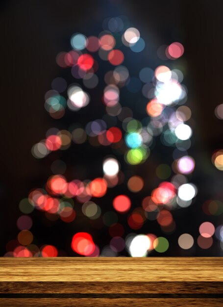 3D Holztisch mit Blick auf einen defokussierten Weihnachtsbaum