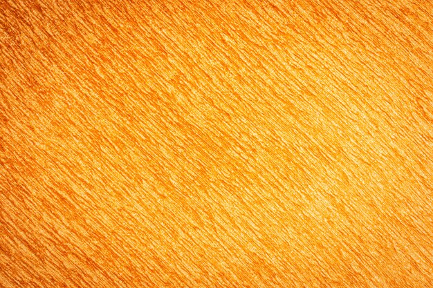 Abstrakte Oberfläche und Textur von orange Baumwollgewebebeschaffenheiten