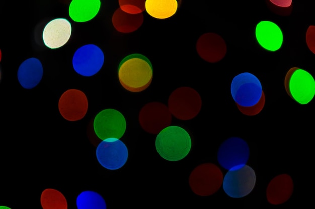 Abstrakter bunter bokeh-lichterhintergrund, unscharfe weihnachtsbeleuchtung für feiertagsdekorationsfoto
