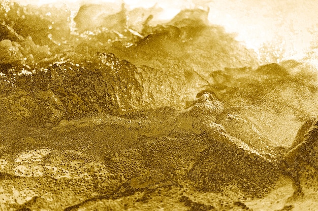 Kostenloses Foto abstrakter goldener holpriger strukturierter hintergrund