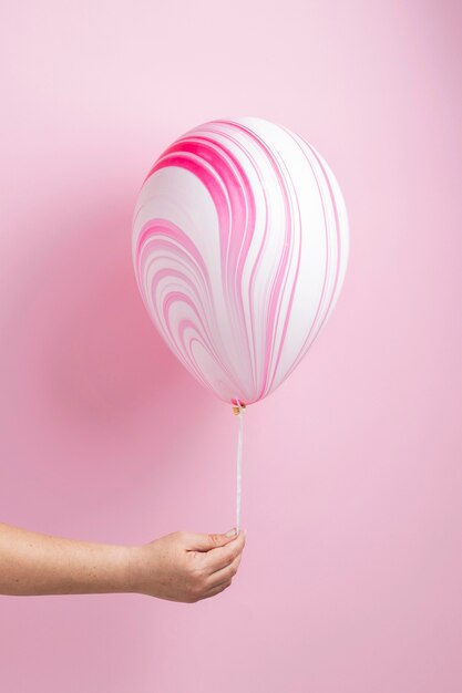 Abstrakter rosa festlicher Ballon