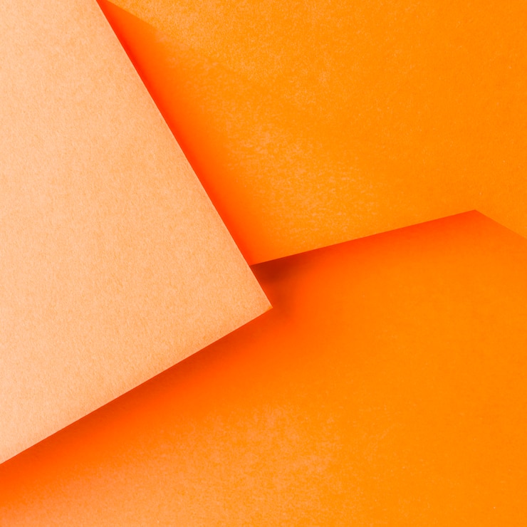 Kostenlose Foto abstraktes orange papierhintergrunddesign