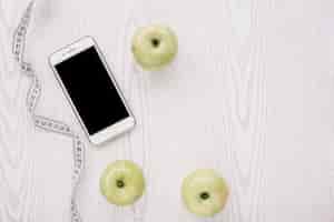 Kostenloses Foto Äpfel, smartphone und maßband