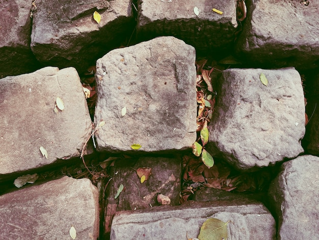 Alte graue Stein-Felsen-Wand