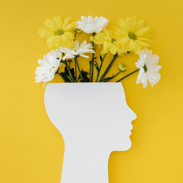 Anordnung des Optimismuskonzepts mit Blumen
