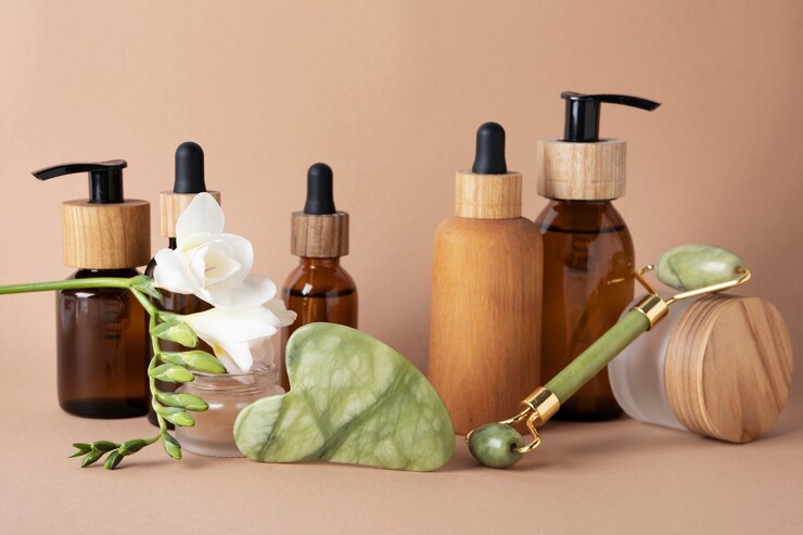 Kostenlose Foto arrangement von gua sha und pflegeprodukten