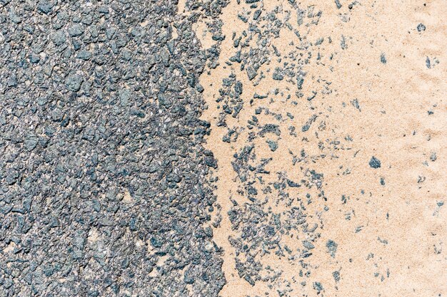 Asphaltstraße mit Sand