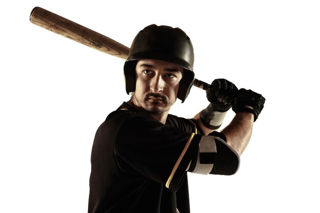 Baseballspieler, Krug in einer schwarzen Uniform, die auf einem weißen Hintergrund übt und trainiert.