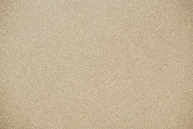 Beige Glitzer strukturierter Papierhintergrund