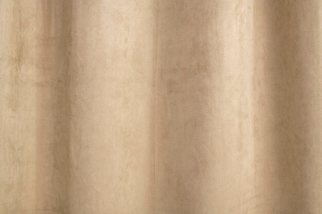 Beige Samtvorhanghintergrund mit Designraum