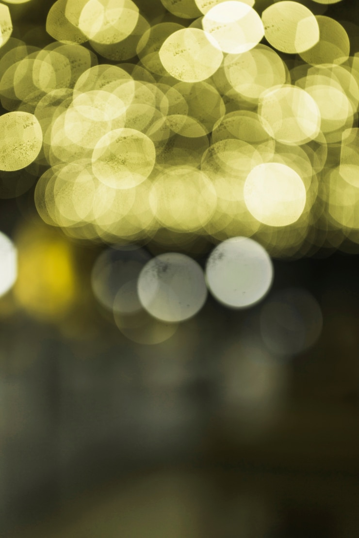 Kostenlose Foto belichteter gelber transparenter defocused hintergrund