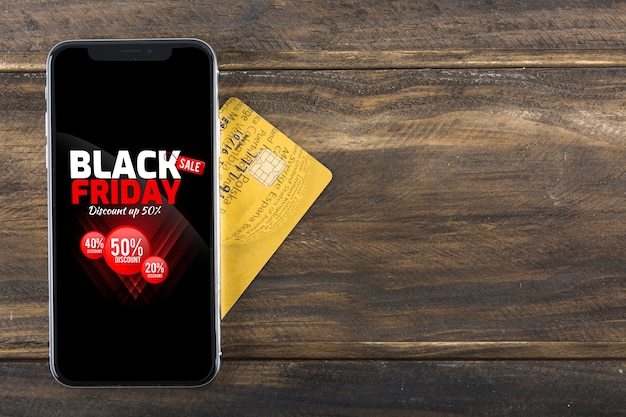 Black friday-text auf schirm des telefons auf tabelle