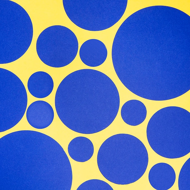 Blaue Kreise des nahtlosen gelben Musters der verschiedenen Größen