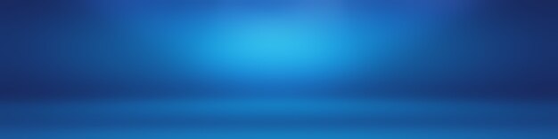 Blauer Hintergrund der abstrakten Luxussteigung. Glattes Dunkelblau mit schwarzer Vignette Studio Banner.