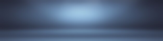 Blauer Hintergrund der abstrakten Luxussteigung. Glattes Dunkelblau mit schwarzer Vignette Studio Banner.