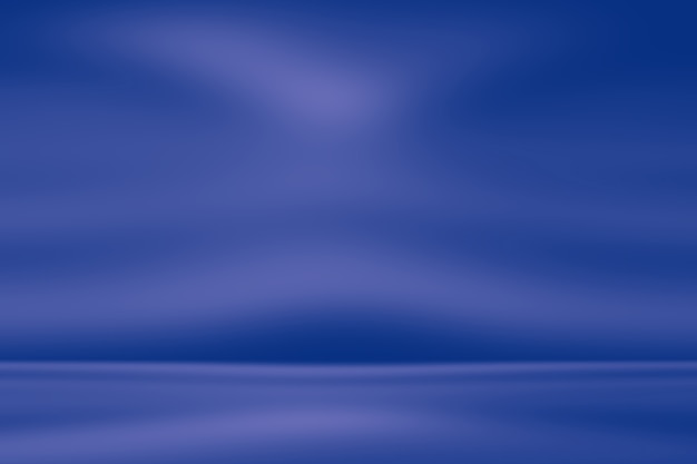 Blauer Hintergrund der abstrakten Luxussteigung. Glattes Dunkelblau mit schwarzer Vignette Studio Banner.