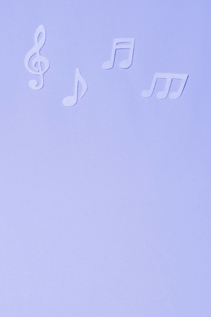 Kostenloses Foto blauer hintergrund mit musiknoten