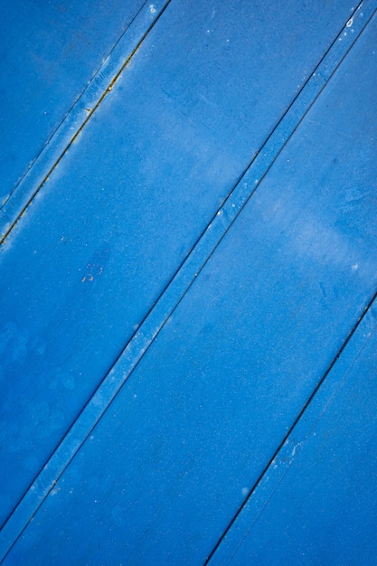 Blauer rostiger Schmutzmetallhintergrund oder -beschaffenheit mit Kratzern und Rissen