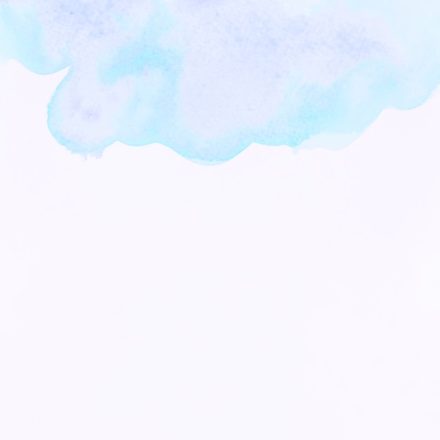 Blaues Aquarellspritzen auf weißem Hintergrund