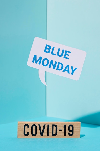 Blaues Montag-Konzept mit Covid-19-Zeichen