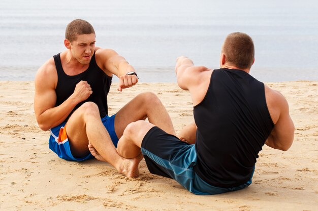 Bodybuilder am Strand