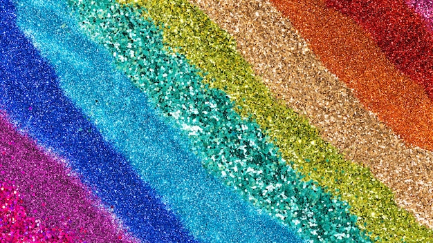 Bunte Regenbogen-Glitter-Hintergrundtextur