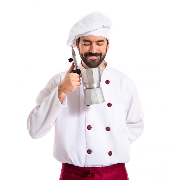 Chef hält coffe Topf