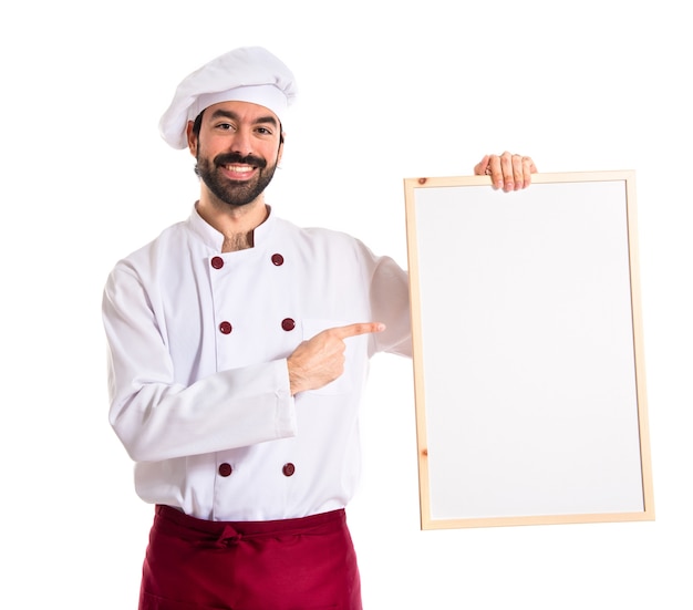 Chef hält leeres plakat