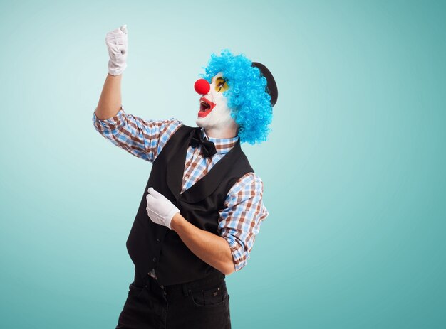 Clown mit einer imaginären Schnur