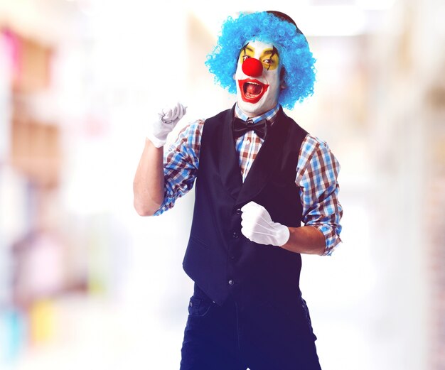 Clown mit unscharfen Hintergrund schreien