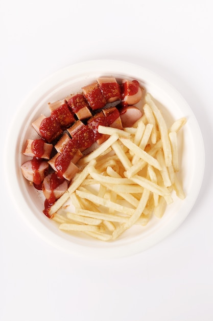 Currywurst mit Sauce und Pommes