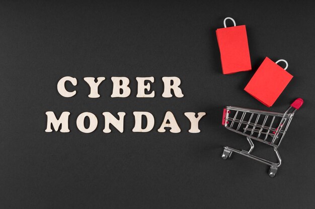 Cyber-Montag-Ereignisverkaufselemente auf dunklem Hintergrund