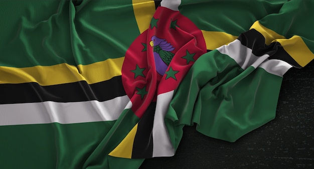 Dominica-Flagge, die auf dunklem Hintergrund geknittert wird 3D Render