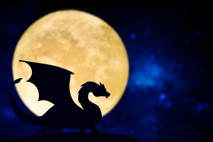Kostenlose Foto drachensilhouette bei vollmond