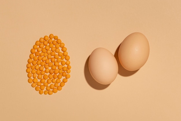 Kostenloses Foto draufsicht bohnen und eier anordnung