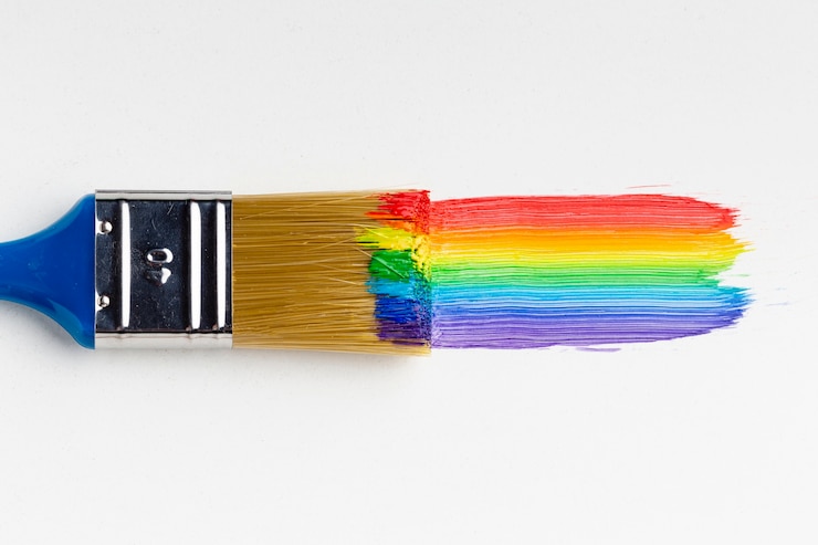 Kostenlose Foto draufsicht der bürste mit regenbogenfarbe