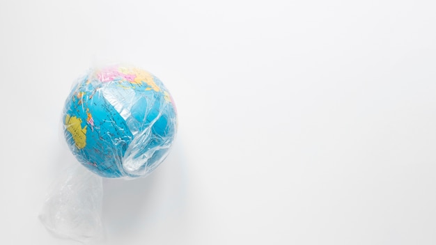 Kostenloses Foto draufsicht des globus mit kopierraum