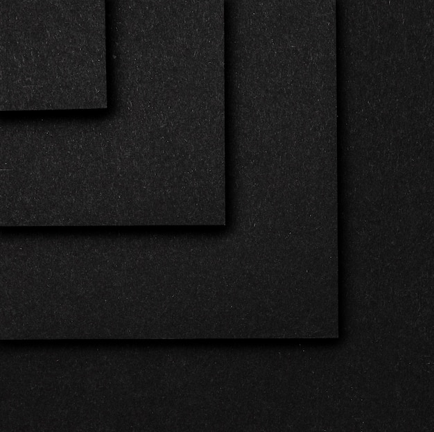 Draufsicht des Hintergrunds der Schichten der schwarzen Quadrate