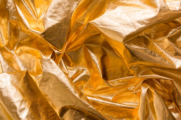 Draufsicht goldene faltige Textur
