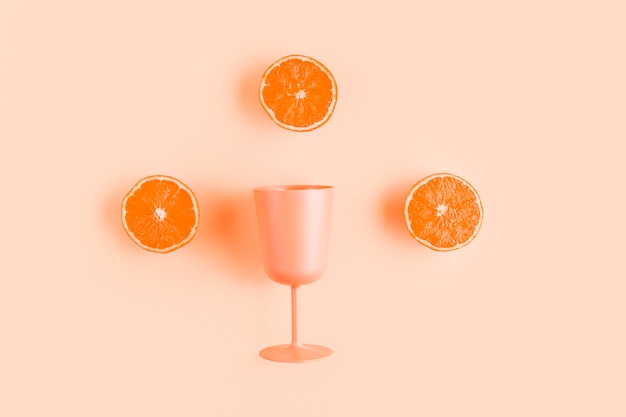 Kostenloses Foto draufsicht halbe orangen mit cup